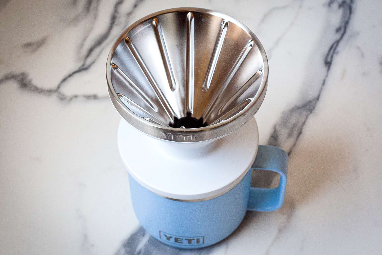 Yeti Rambler Pour-Over on top of a blue Yeti mug