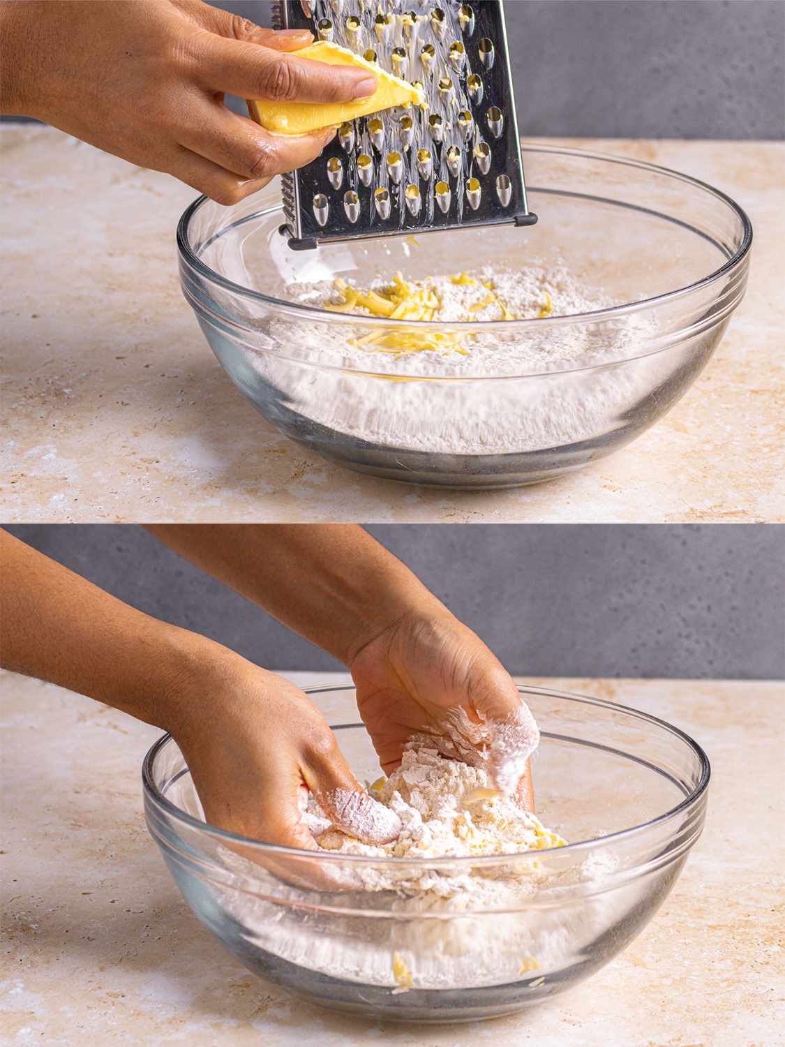 Grating butter into dry ingredients using a box grater.