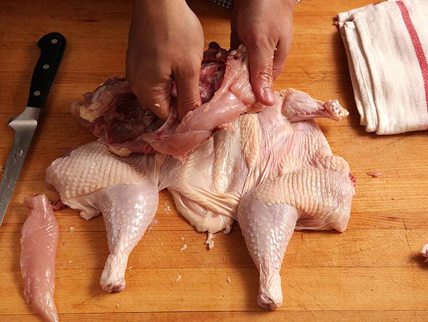 Removing tenderloin from the turkey carcass
