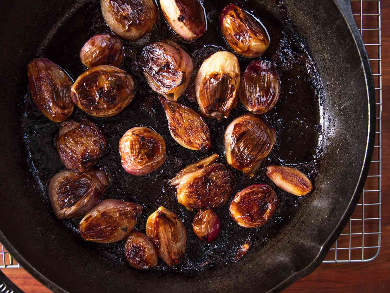 A close up of roasted shallots.