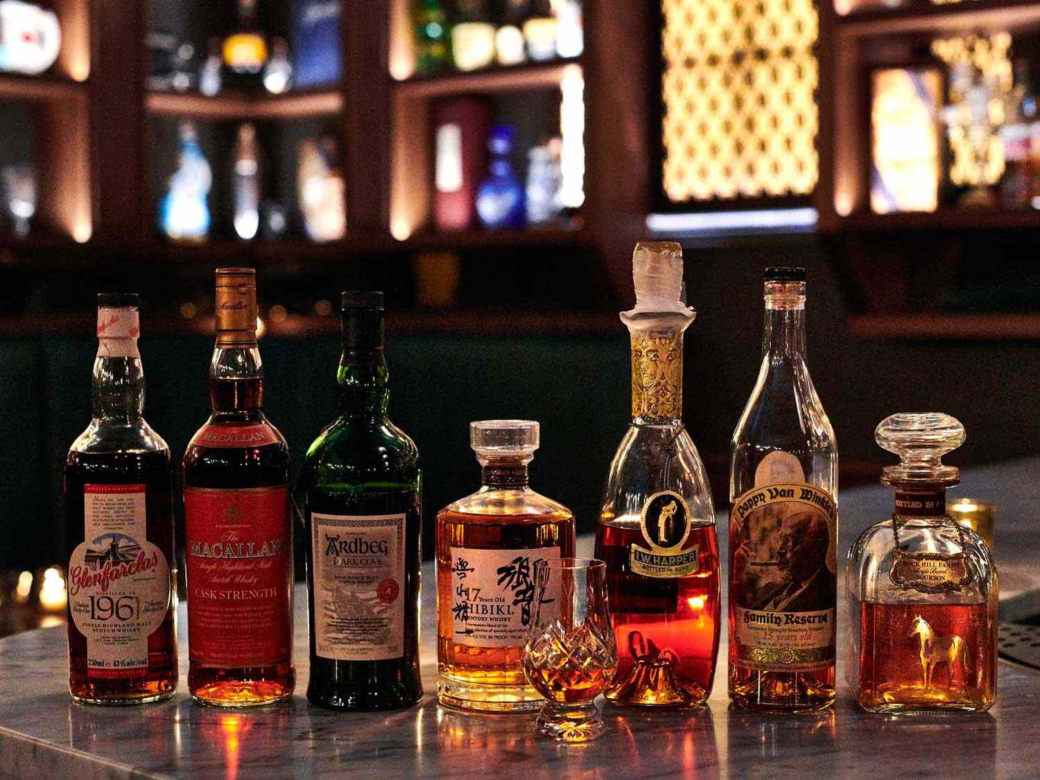 A lineup of whiskies at Scotch Lodge