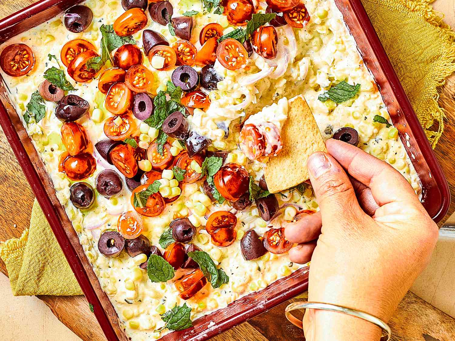 Taking a dip of corn dip 