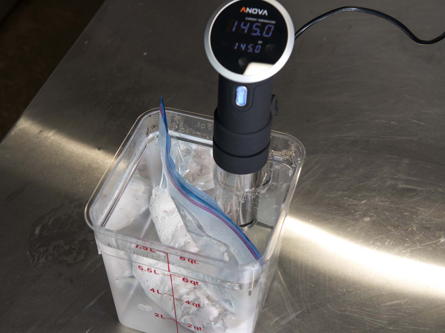 Cooking sous vide turkey breast using a sous vide immersion circulator.