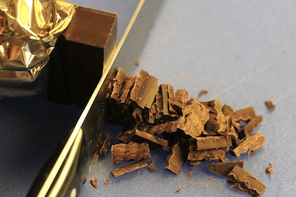 chopping block dark chocolate into fine pieces