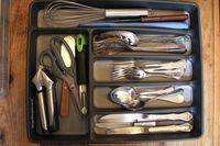 madesmart drawer organizer with utensils in it