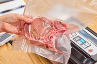 A bag of meat vacuum sealed using the Nesco VS-12 Deluxe Vacuum Sealer