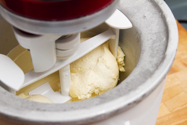 Vanilla frozen custard is churned using a kitchenaid mixer with ice cream bowl and paddle attachment.