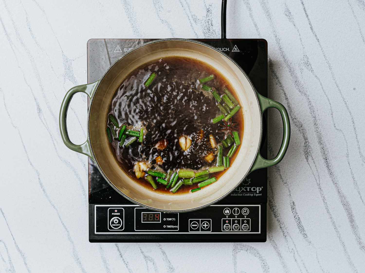 Overhead of braising liquid