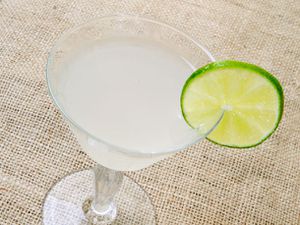 The El Floridita Daiquiri in a cocktail glass with a lime wheel on the rim.