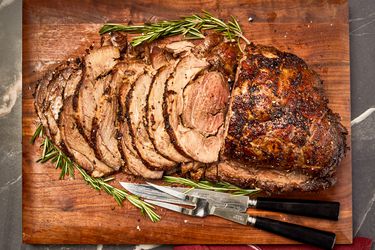 Overhead view of leg of lamb sliced 