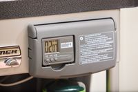 The digital display of a charcoal grill