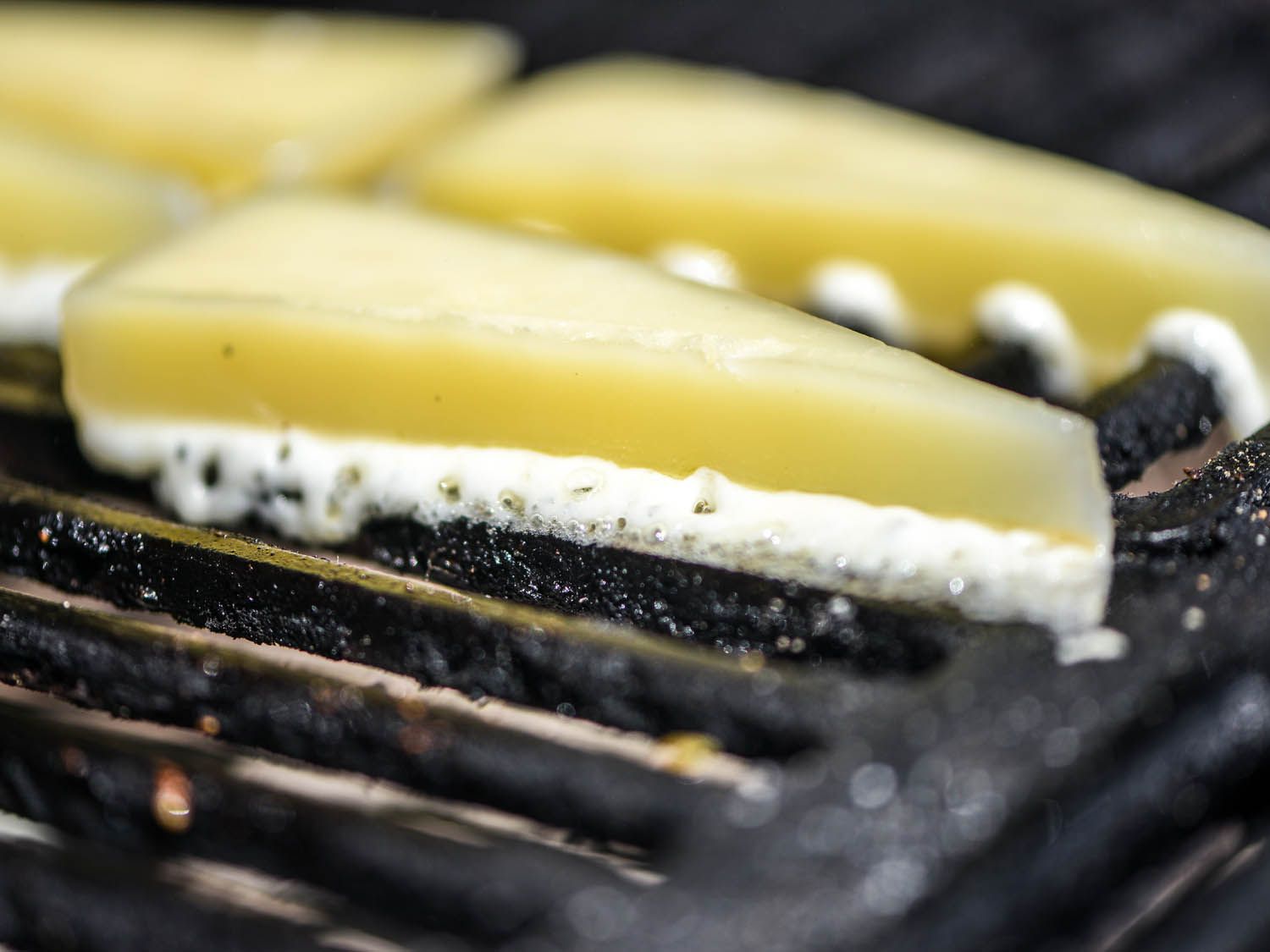 triangles of kasseri cheese on the grill