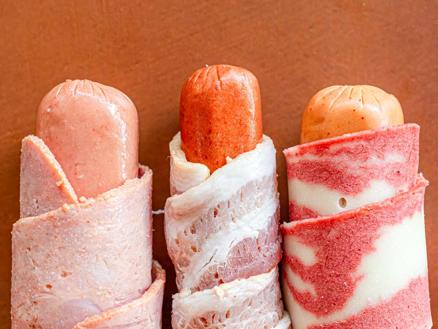 Overhead view of wrapping hotdog