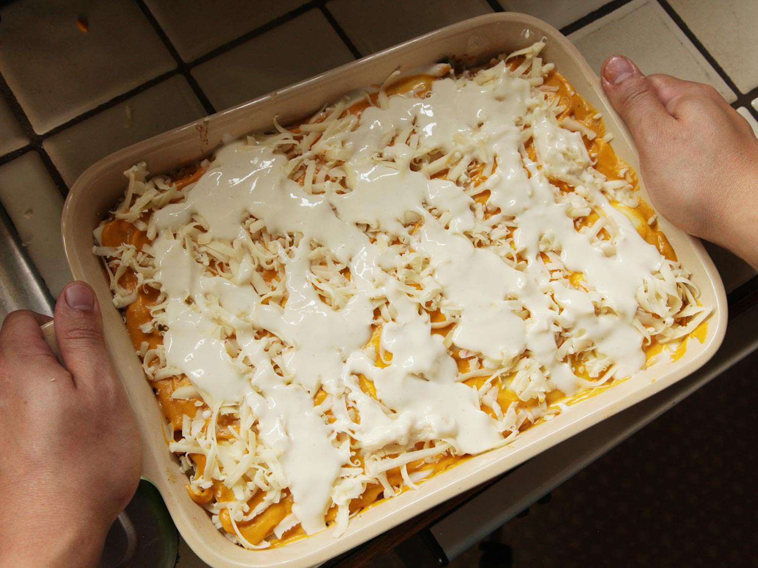 Assembled squash lasagna in a baking dish.