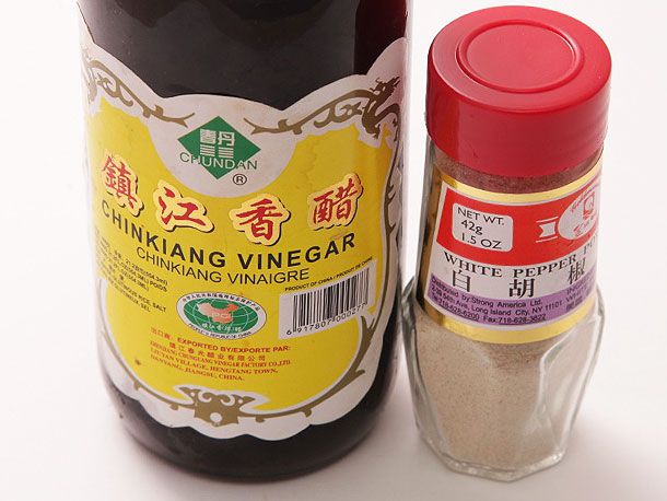 Chinkiang vinegar and ground white pepper.