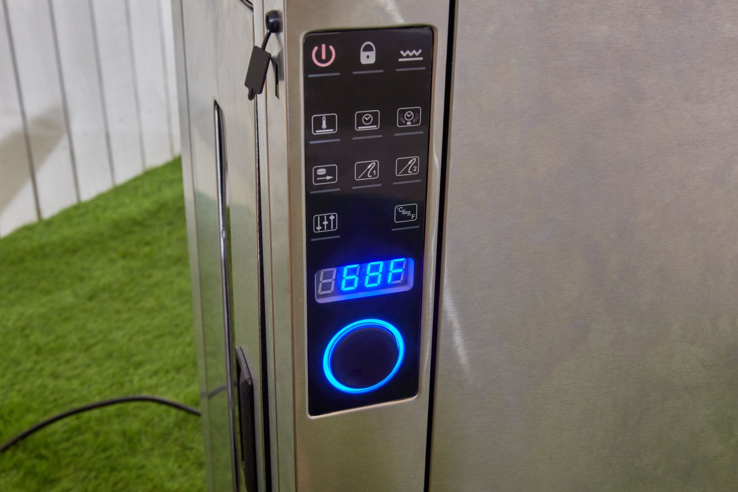 The buttons on the Bradley Professional P10 4-Rack Outdoor Electric Smoker (BS1019)