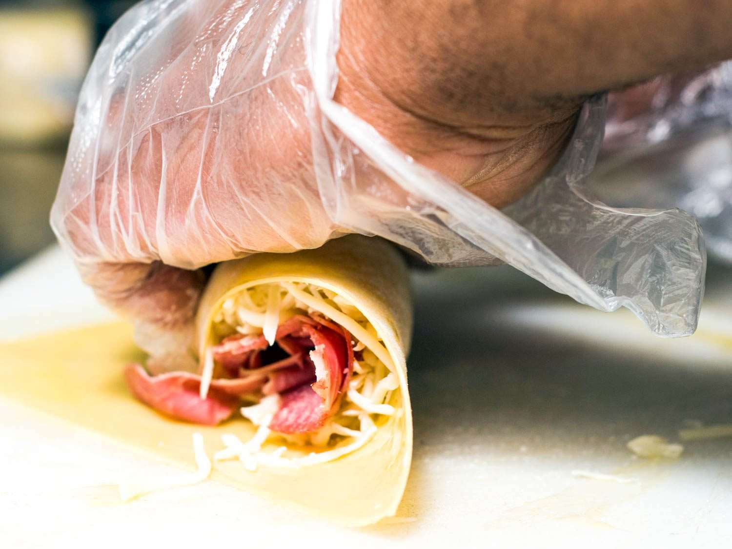 Rolling a corned beef egg roll at Mr. Fo-Fo's.