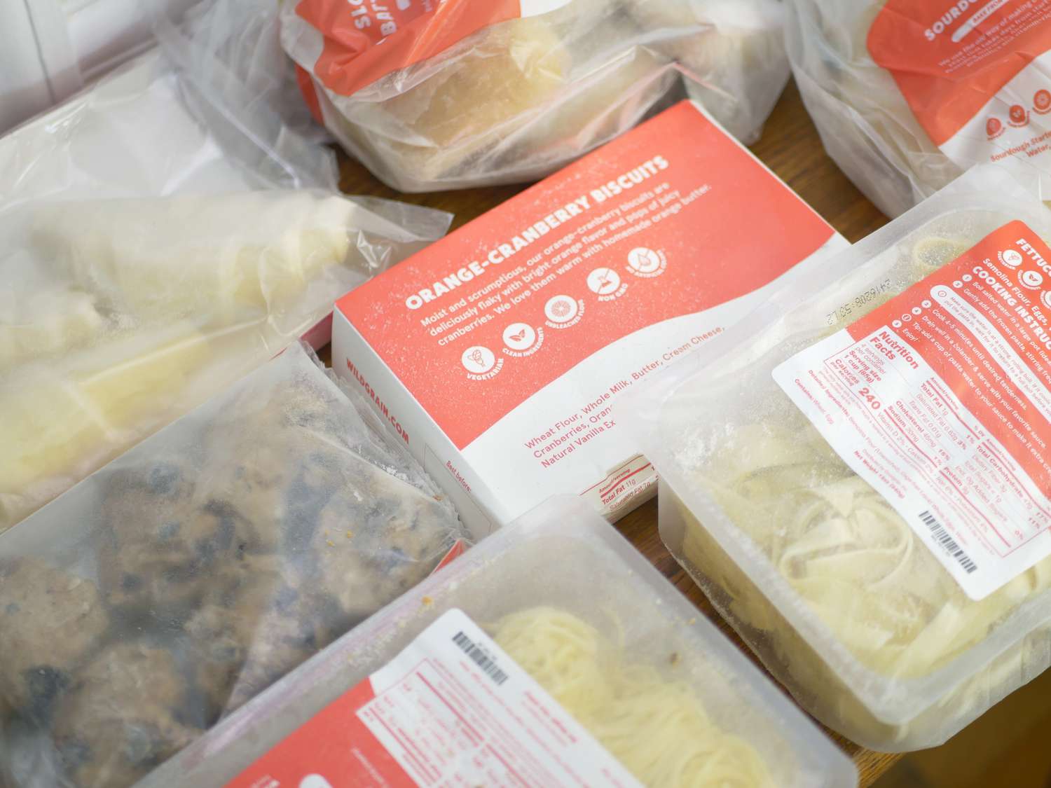 the wildgrain box contents on a wooden countertop