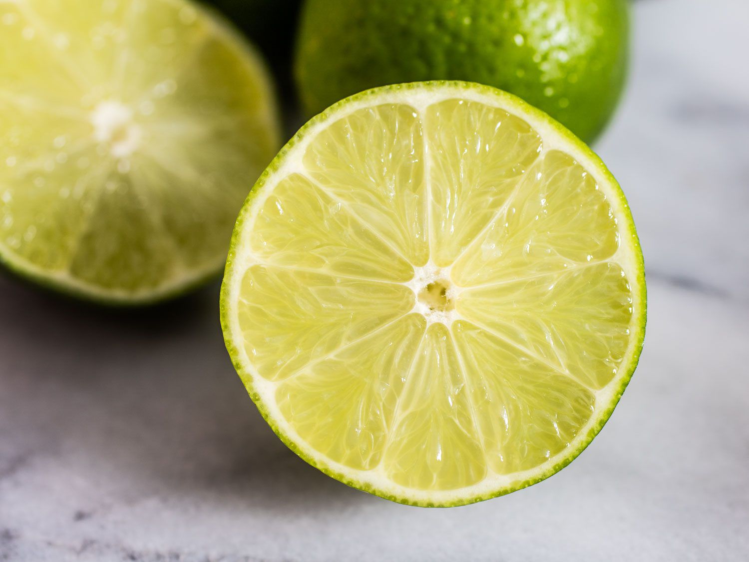 Close-up of halved limes.