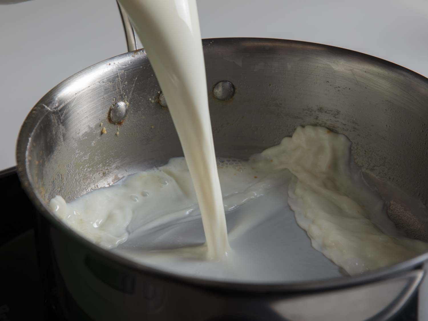 "Deglazing" the brown butter pan with milk.