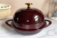 a maroon bread cloche