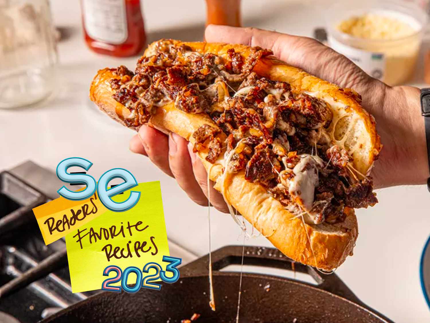 Cheesesteak photo with a graphic button on it