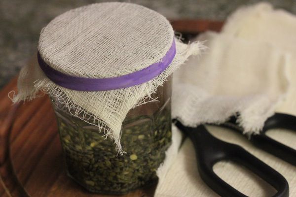 Sprouts in water with a drainable lid on top 