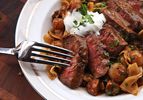 A plate of beef stroganoff.