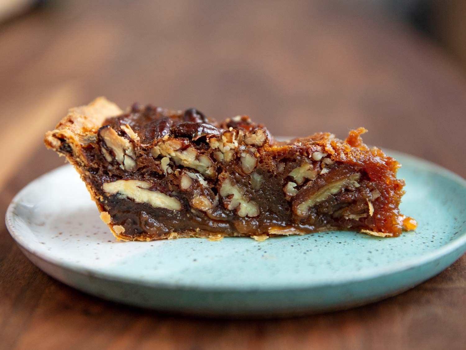 A slice of pecan pie on a plate