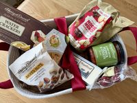 The Harry & David Season's Best Gift Basket filled with packaged goods and food.