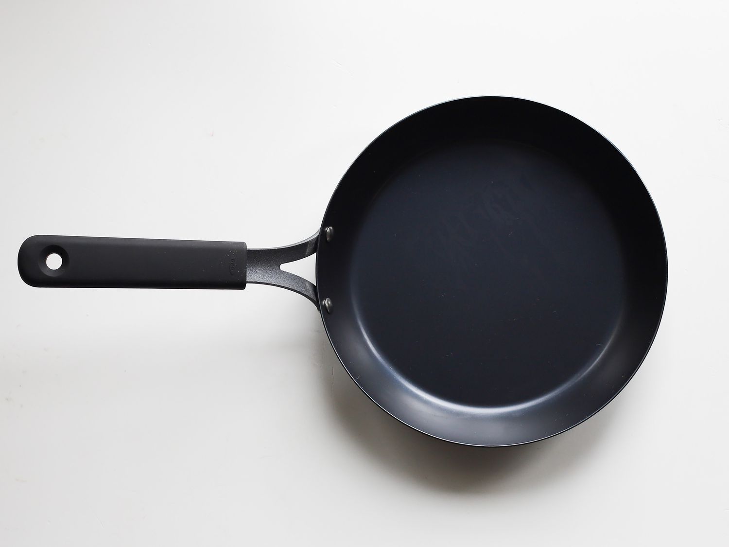 OXO carbon steel skillet on a white backdrop