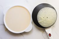 a small crepe cooking on the moss stone electric crepe maker