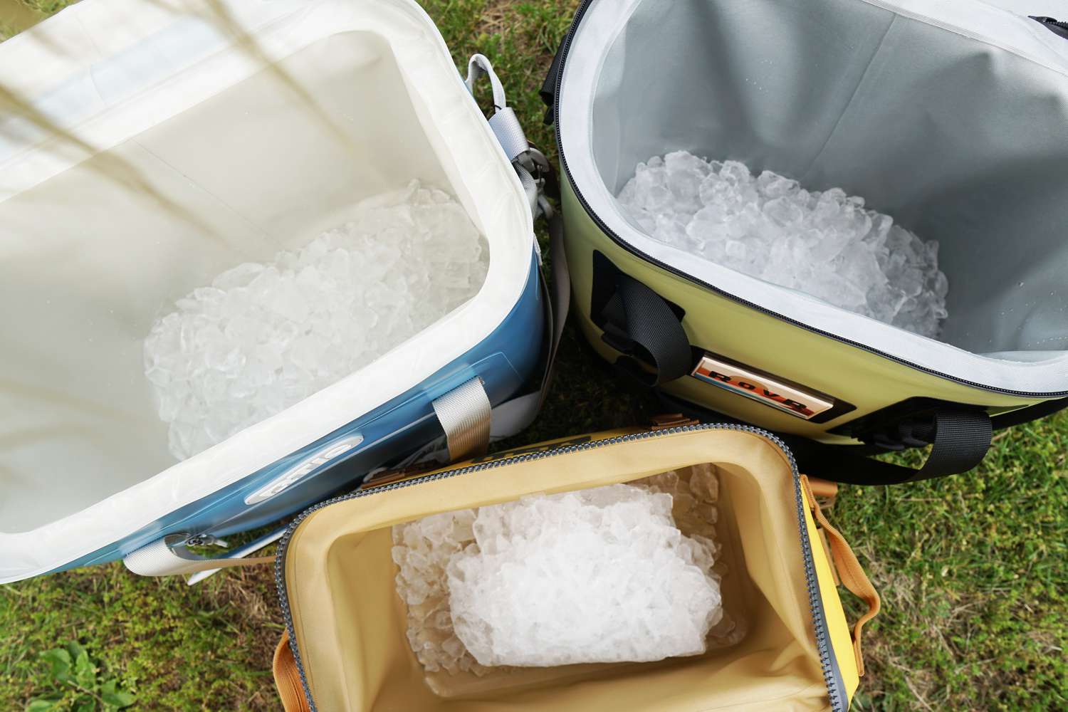 three coolers filled with ice