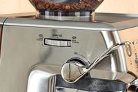 Close up of the grind size wheel on the Breville Barista Express Impress