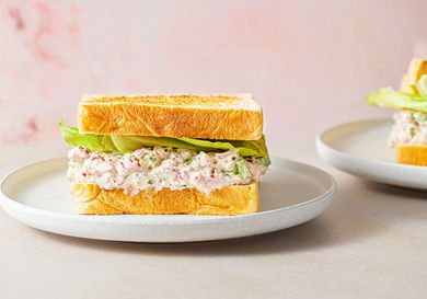 Tuna salad sandwich served on a plate