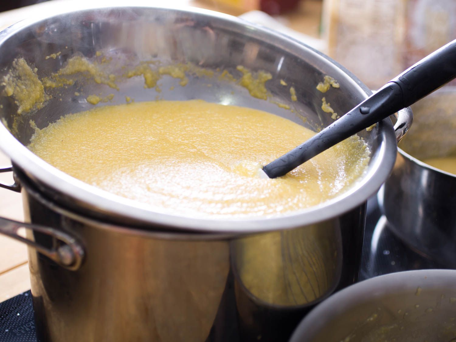 Polenta cooking in a double-boiler.