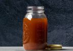 Pressure cooker beef stock in a jar