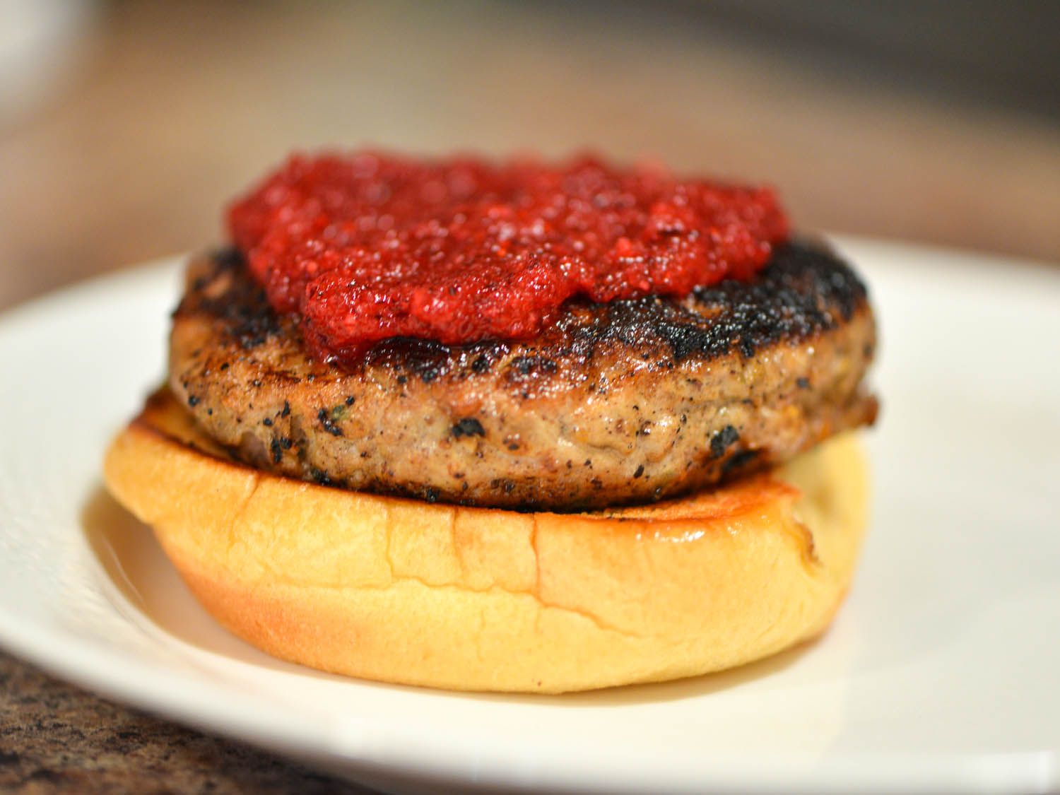 Turkey burger topped with cranberry-apple relish.