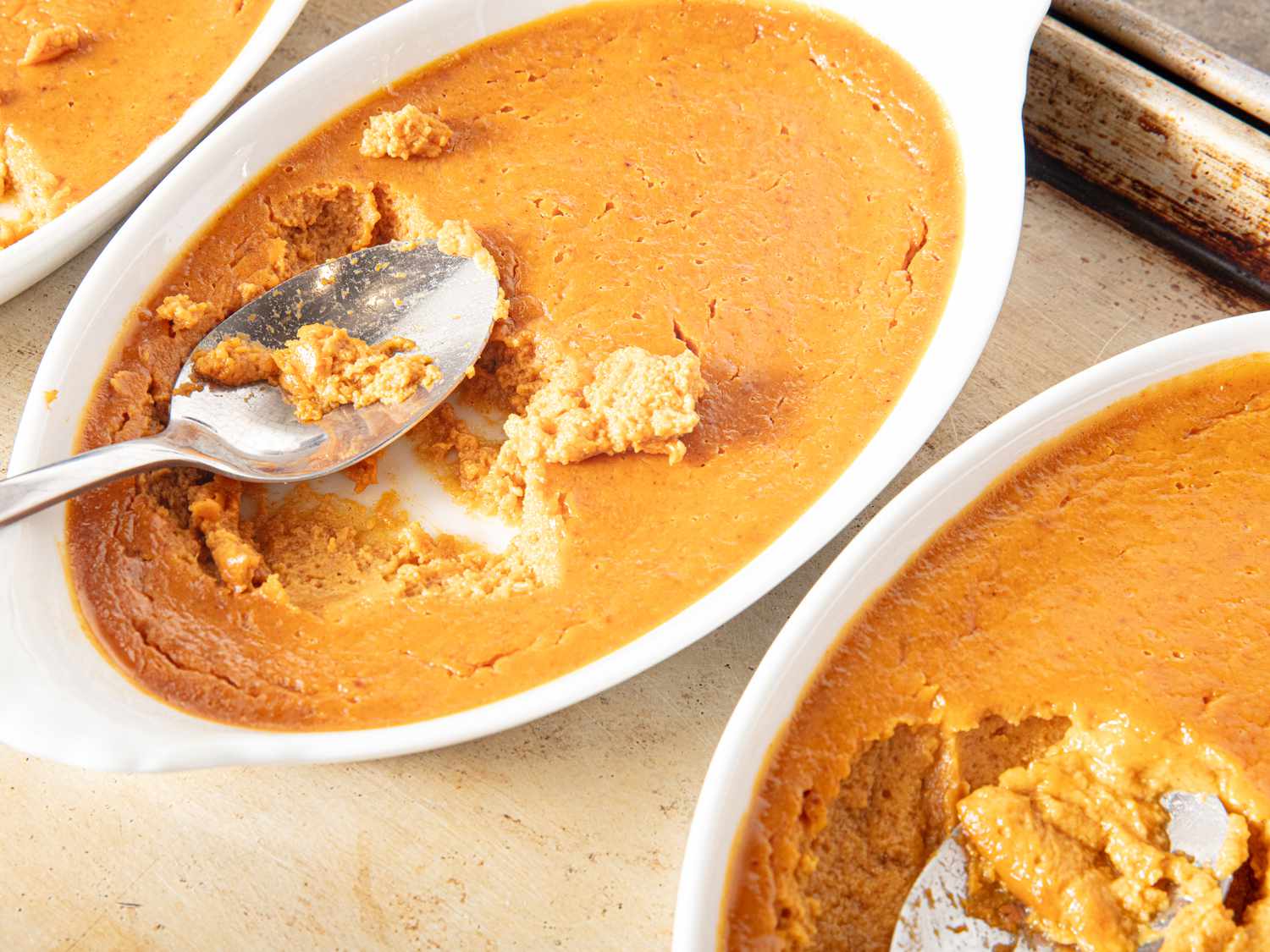 Overhead view of a scoop of pumpkin puree