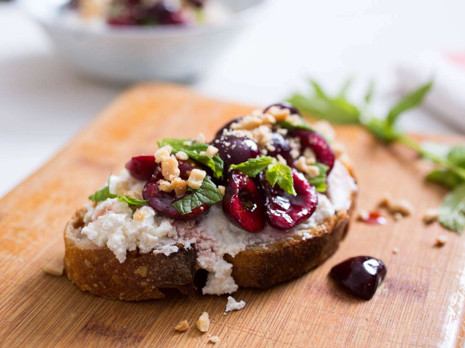 The finished cherries and ricotta, served on a slice of toast.