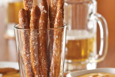 Pretzel rods in a glass