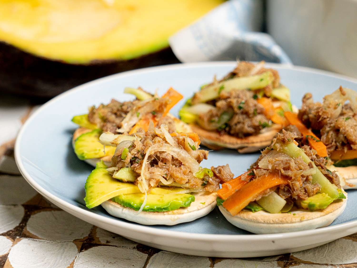 Side angle view of pickled herring on wafer
