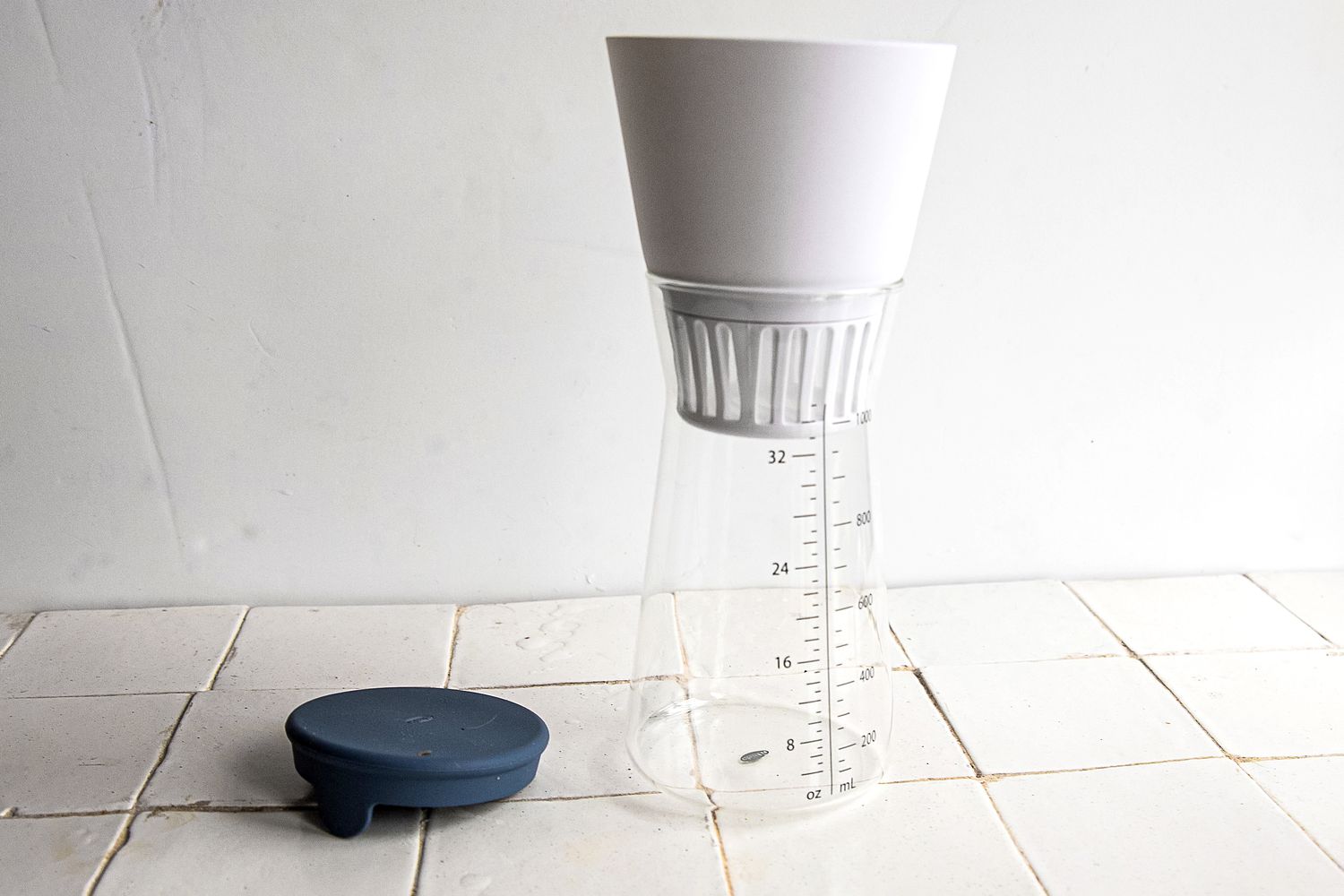 chefn nut milk maker on a white tile surface