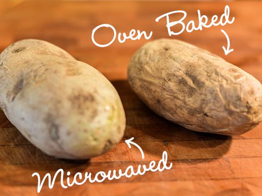 A labeled image of two cooked russet potatoes. One is labeled "oven baked," the other "microwaved." The former looks significantly drier and shriveled on the exterior.