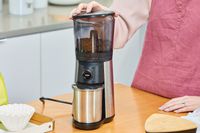 Coffee is ground in the OXO Brew Conical Burr Coffee Grinder