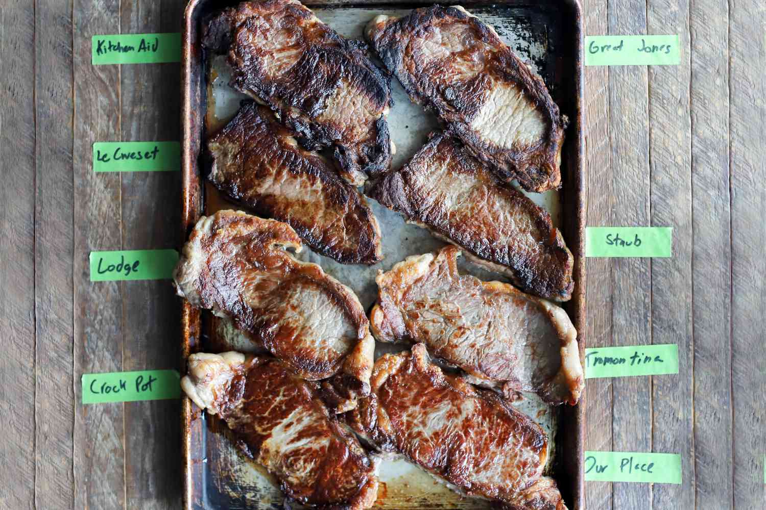 multiple pork chops on a sheet pan