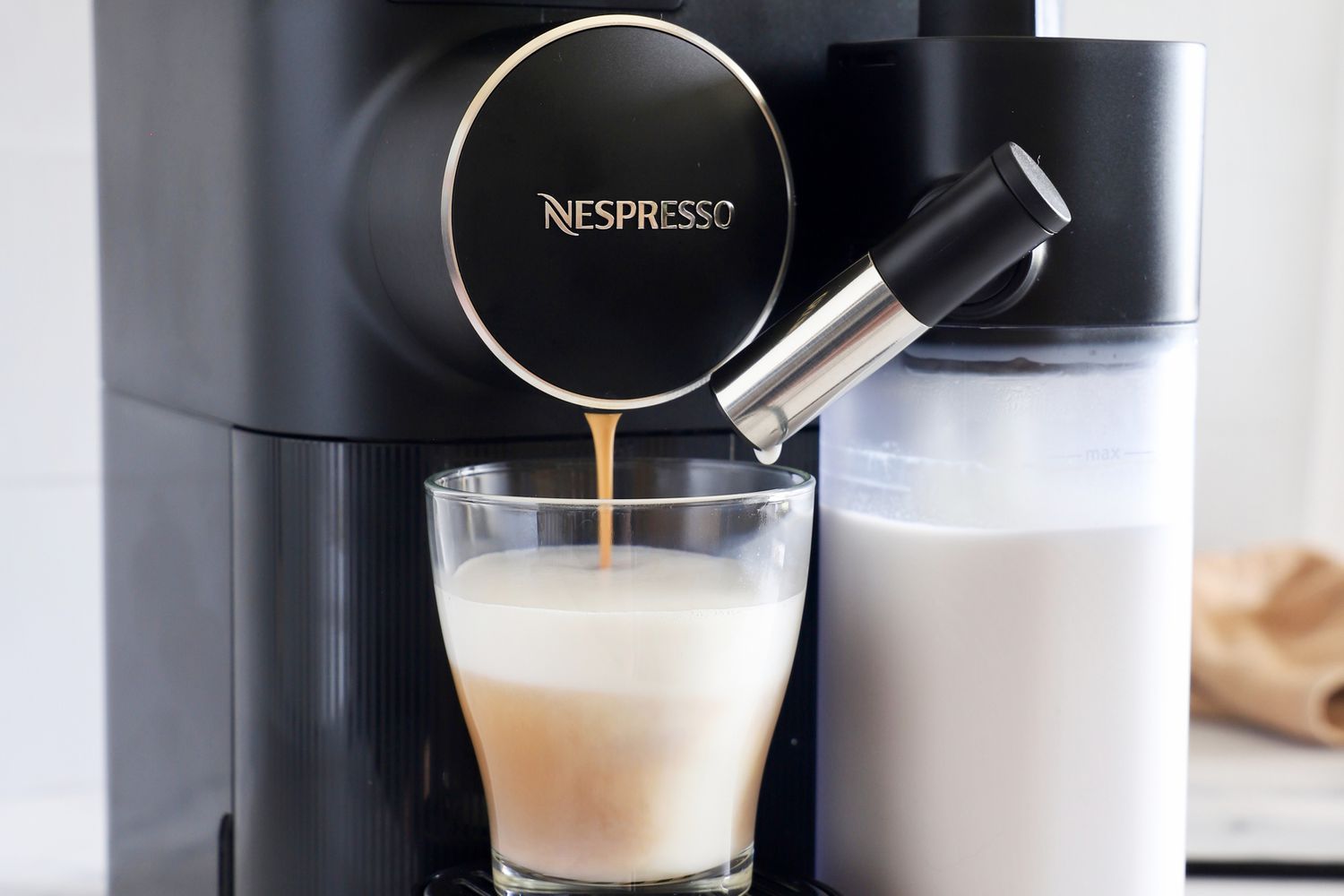 Nespresso Gran Lattissima Original Espresso Machine by De’Longhi dispensing espresso into a cup