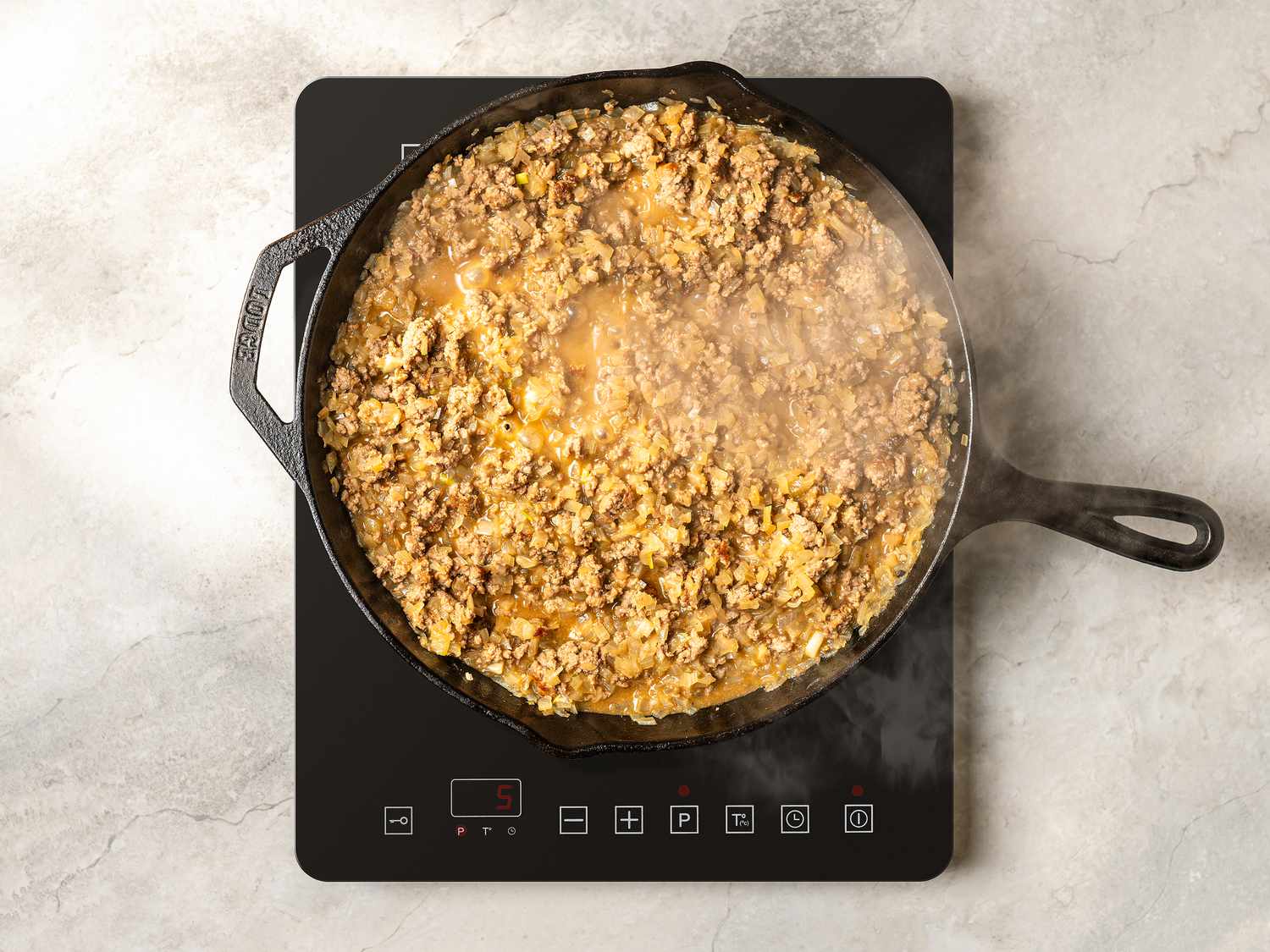 Mixed beef and onions, thickened, and cooked for about 10 minutes 