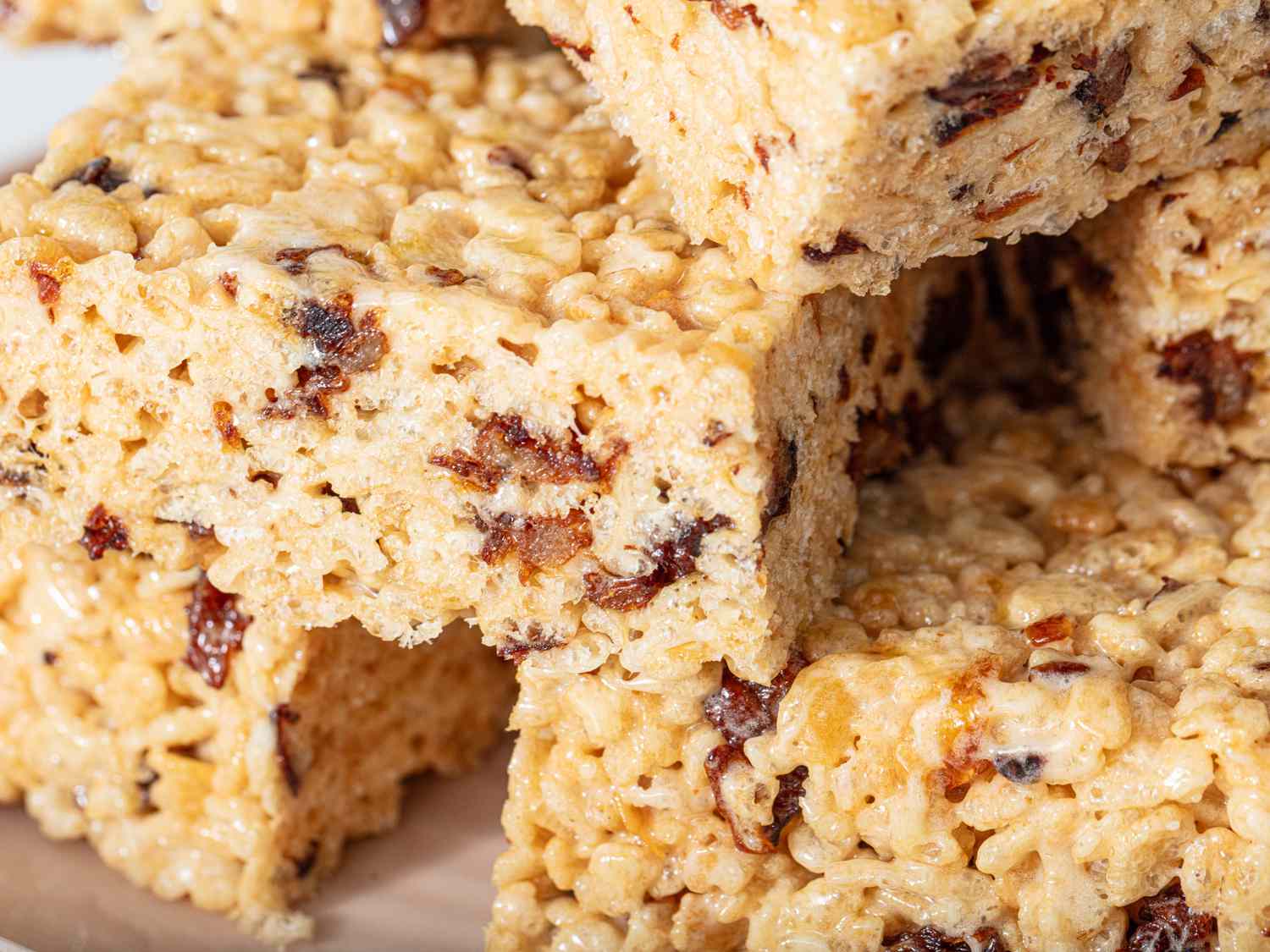 Plate of Shmaltz Rice Krispie Treats cut into squares