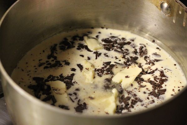 finely chopped chocolate in pot of hot cream